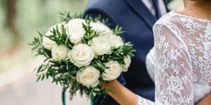 Wedding couple with flowers