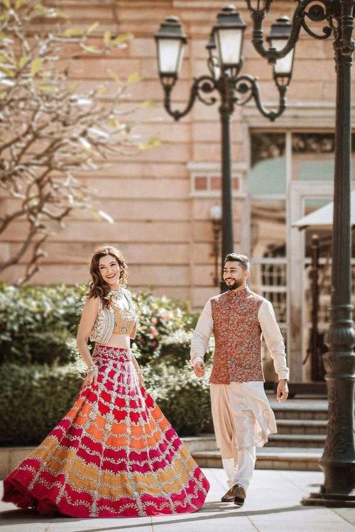 Radhika Merchant's Pre-Wedding Ensembles: A Fashion Journey from Custom  Versace Dress to Dazzling Gold Lehenga - Oneindia News