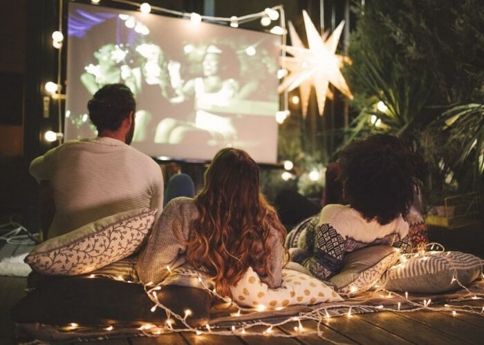 Couple watching movie at night 