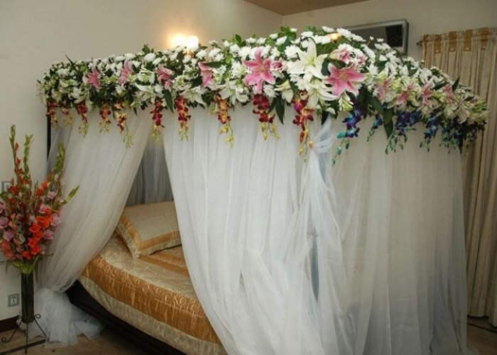 canopy decorated with flower for the wedding firs night