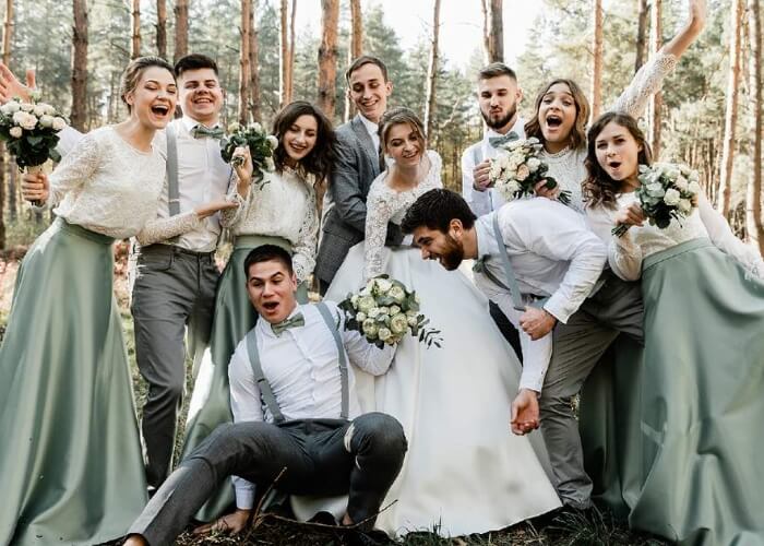 Wedding Couple with Their Friends Enjoying