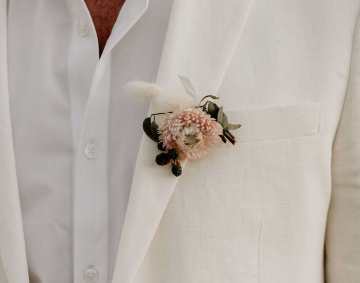 Pastel Mum With Bunny Tails and Berries Boutonniere