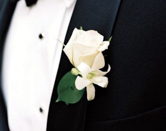 White Orchid With Dotted Ribbon Boutonniere
