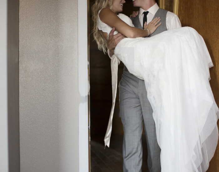 Carrying a bride over the threshold