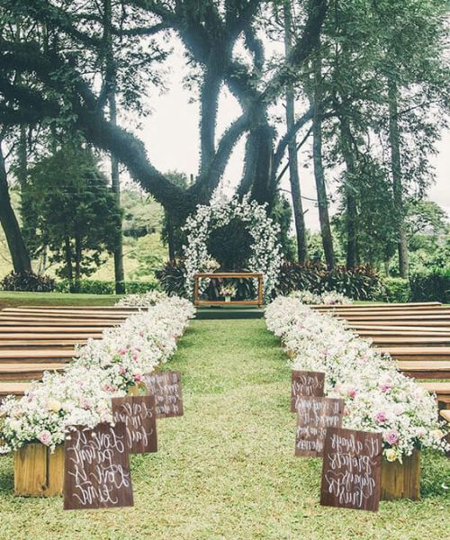 Potted flower arrangement aisle decor