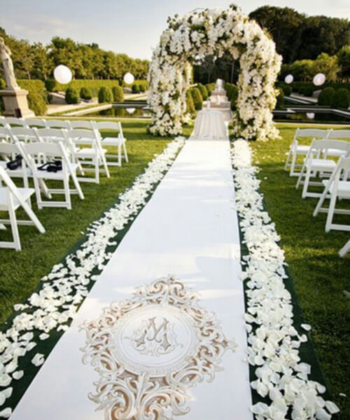 White Rose Petals along with the Wedding aisle