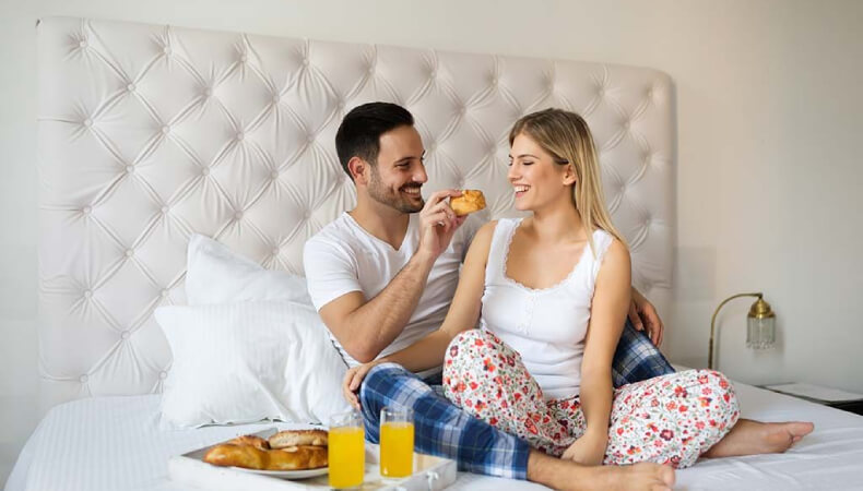 Couple Breakfast in Bed