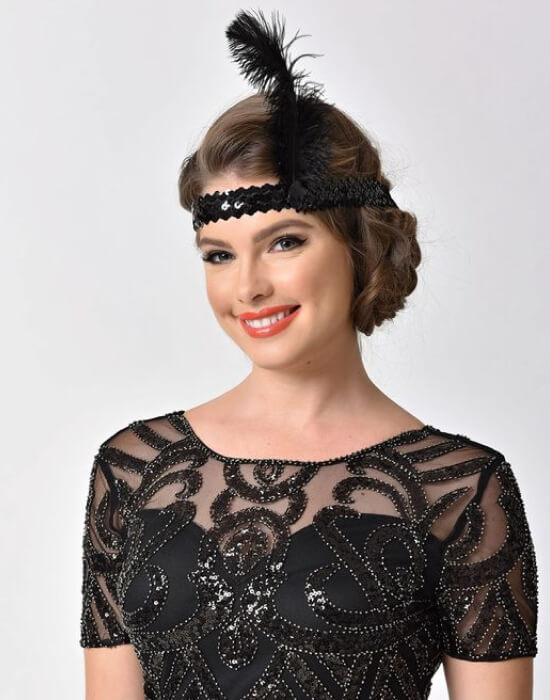 1920s-inspired finger waves with a feathered headband