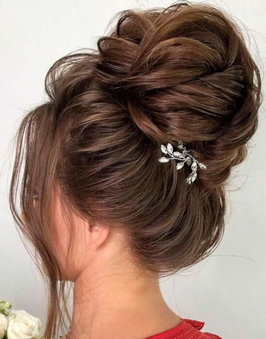 Elegant top knot for medium to long hair
