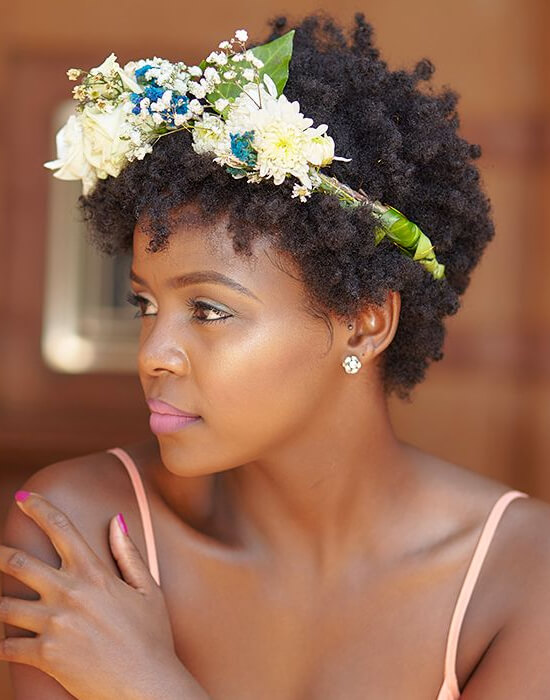 Textured afro with a floral crown