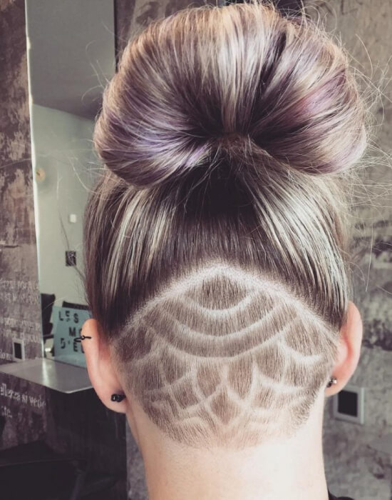Undercut with geometric patterns and floral accents