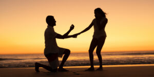 Couple Propose on Beach