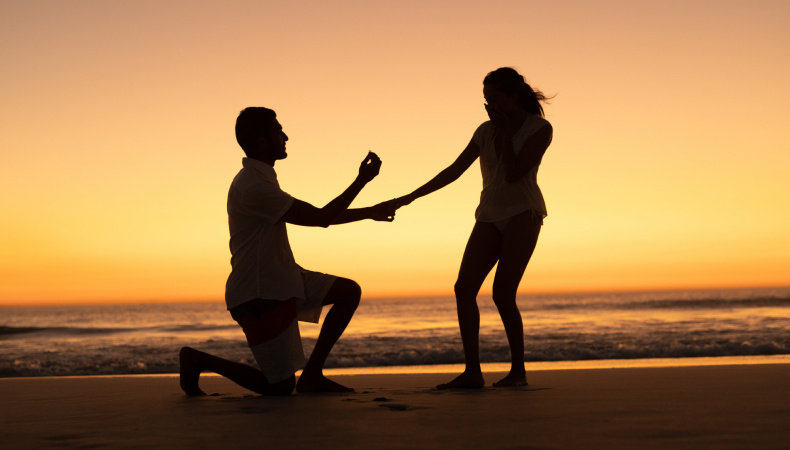 Couple Propose on Beach