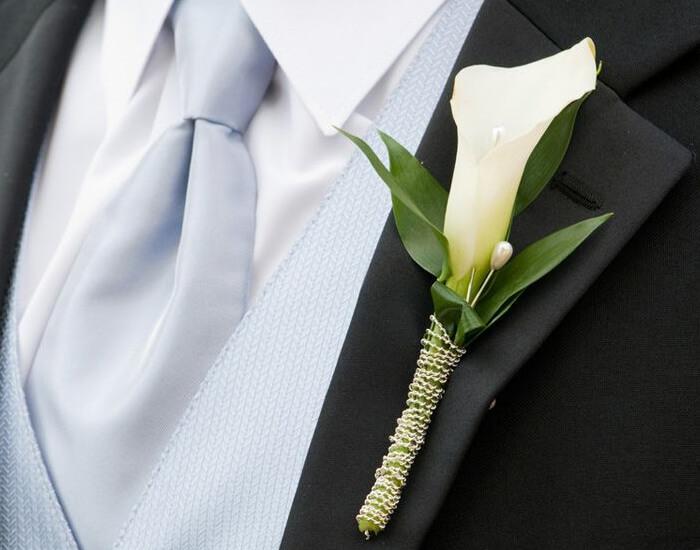 Timeless White Lily Boutonniere