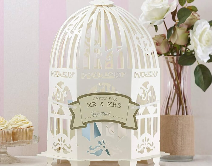Vintage Birdcage Wishing Well adorned with flowers