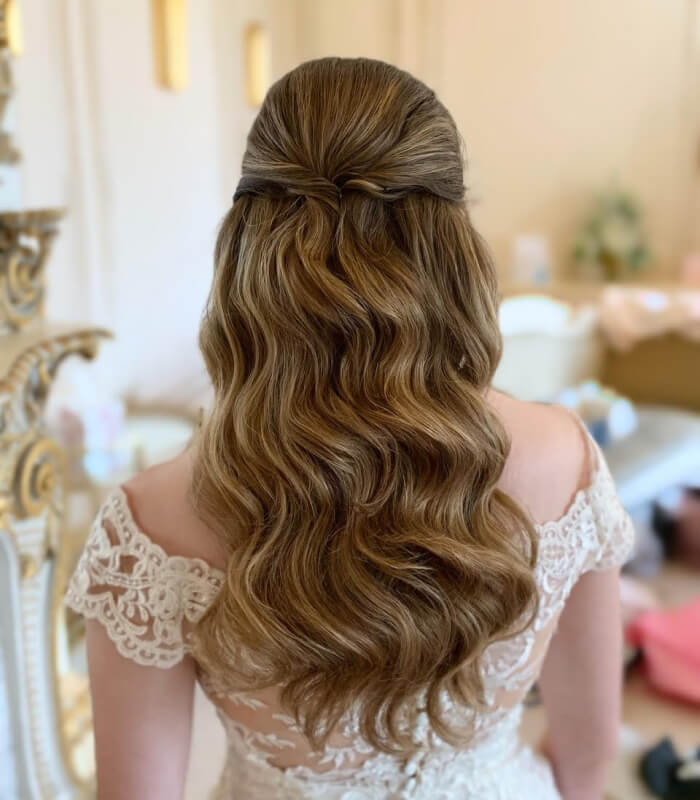 Old Hollywood waves with a half up twist