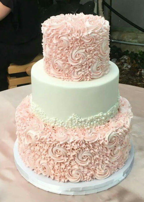 Blushing Buttercream Pearl Wedding Cake