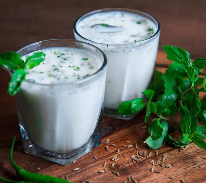 Traditional South Indian buttermilk served in glasses with spices