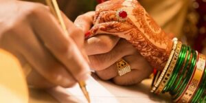 Court marriage ceremony moment with bride’s hands and marriage papers