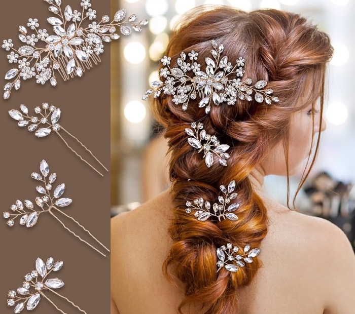 Bridal hair accessories with crystal floral pins styled in an elegant braided wedding hairstyle.