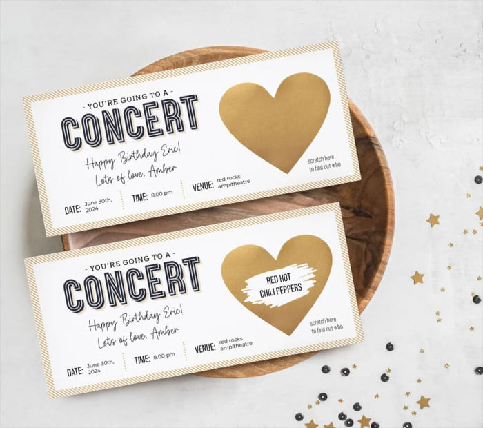 Scratch-off concert ticket gift with heart design, revealing a surprise band, shown as a creative and unique Valentine’s Day gift idea.