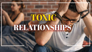 Is Your Relationship Toxic? Red Flags and Warning Signs Colorful blog cover showing a stressed man holding his head in the foreground while a woman sits blurred in the background, with the text “TOXIC RELATIONSHIPS.