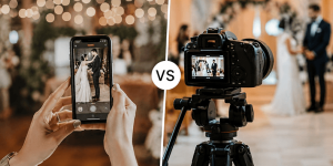 Wedding content creator filming with a smartphone vs. videographer using a professional camera.